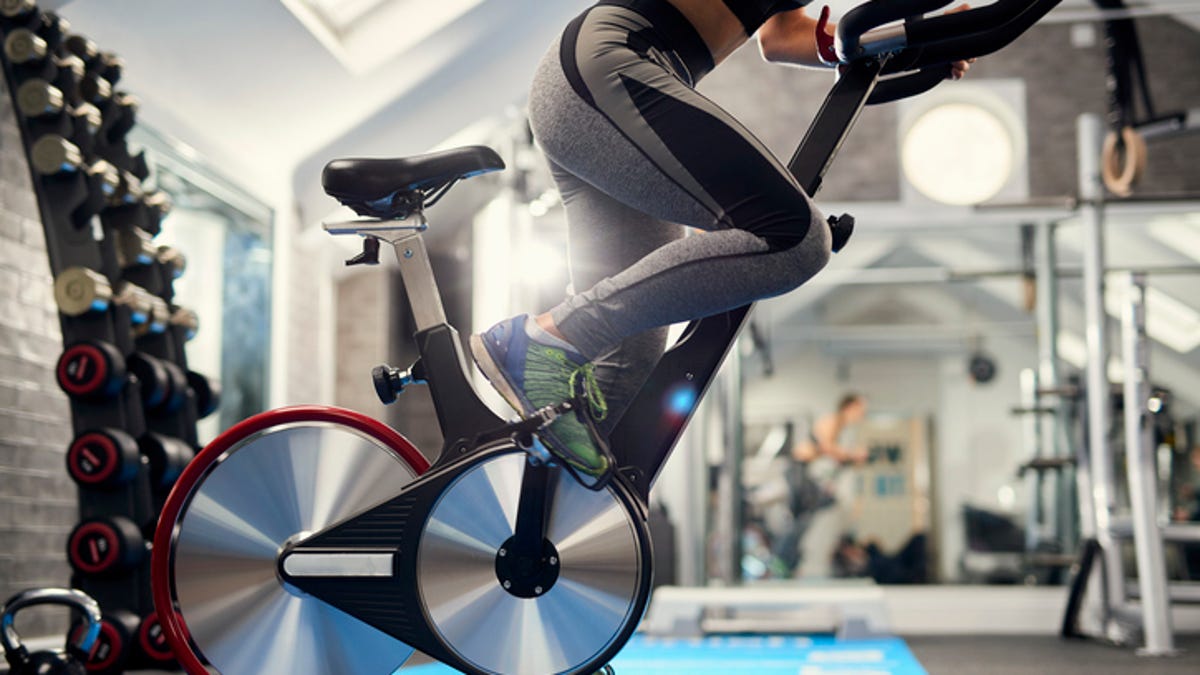 9 Ways You’re Using Your Exercise Bike Wrong, According to Cycling Pros