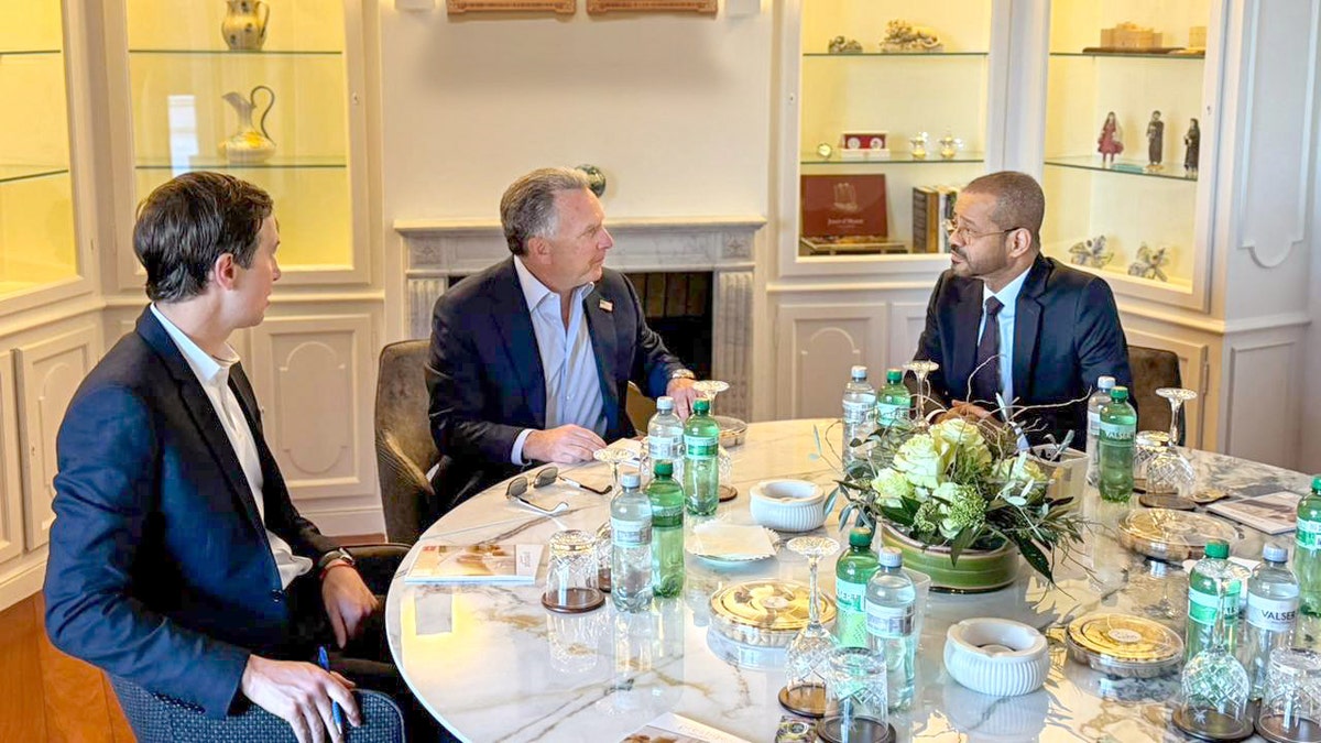 Jared Kushner, Steve Witkoff, and Sayyid Badr Al Busaidi seated at a round table.