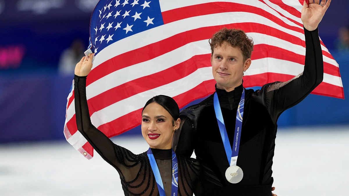 Madison Chock and Evan Bates wave