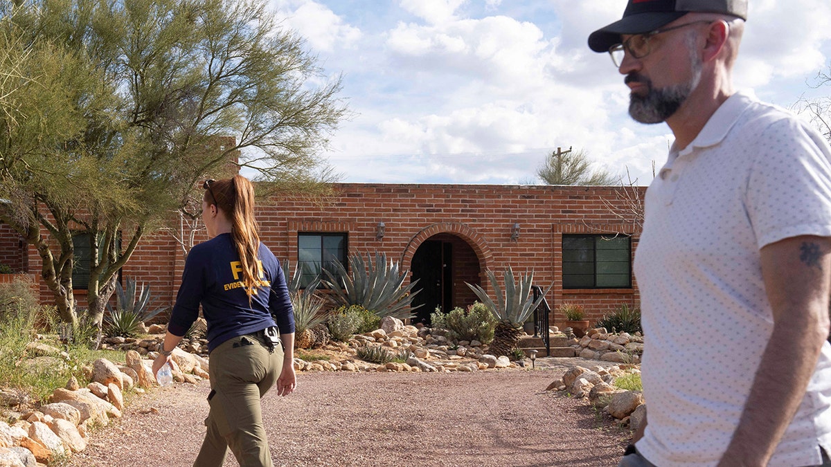 Investigators searching the grounds of Nancy Guthrie's property in the Catalina Foothills.