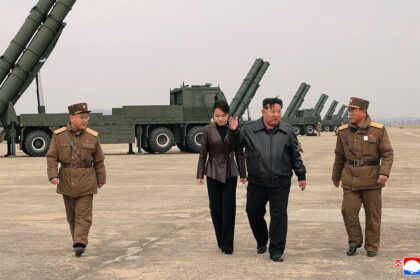 Kim Jong Un appears with teenage daughter at live-fire rocket test in North Korea