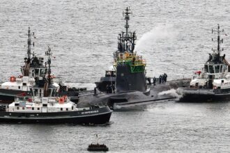 Iranian man, Romanian woman charged after allegedly trying to enter UK nuclear missile base, officials say