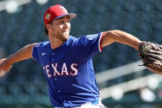 Rangers pitcher learns he made opening day roster during game