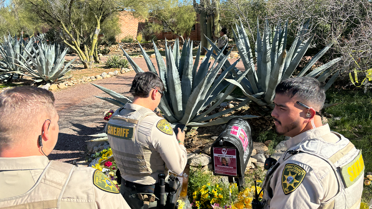 Deputies outside Nancy Guthrie's home
