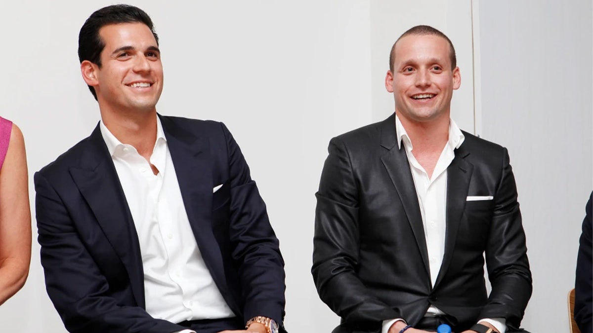 Oren Alexander and Tal Alexander speaking at a panel