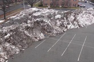 NJ rail line takes bets on when ‘snow mountain’ in station parking lot will finally melt