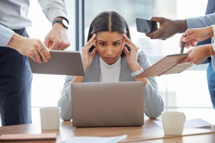 A staggering amount of burned-out workers say they’re doing 3 jobs at once — without a raise or promotion