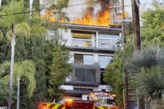 Inferno erupts at Hollywood Hills mansion as flames rip through roof