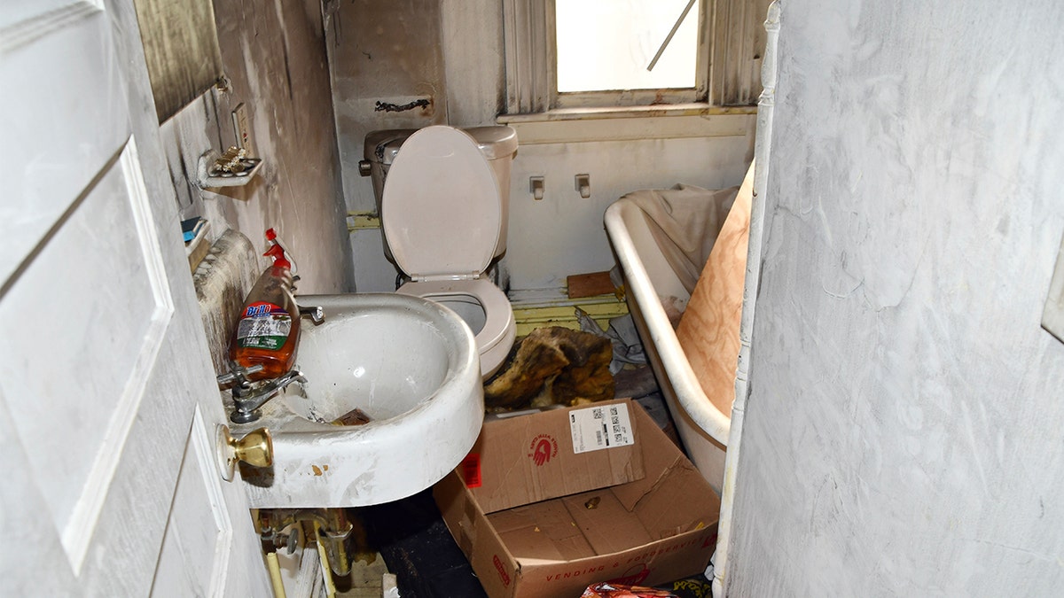 A dirty bathroom is seen in Kimberly Sullivan's Connecticut house