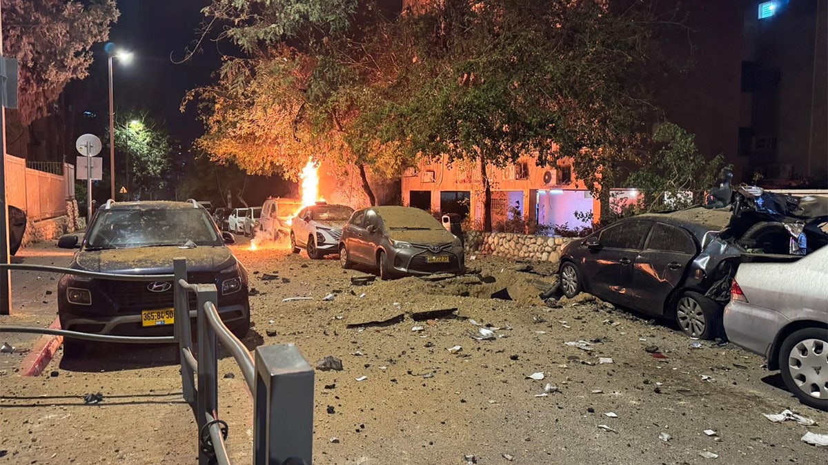 fiery aftermath in the Israeli neighborhood of RAMAT GAN, ISRAEL