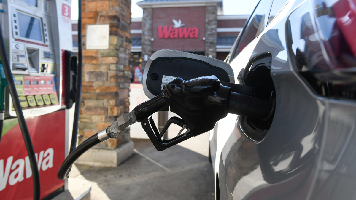 A driver refuels a vehicle at a Wawa gas station in Media, Pennsylvania on Monday, March 2, 2026.