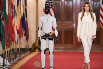 Melania Trump Escorted by Talking Humanoid Robot at White House Tech Summit