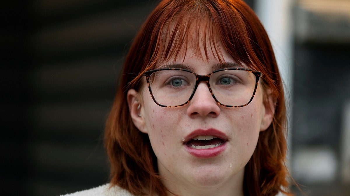 Keira Coady speaking outside her home in West Des Moines, Iowa.
