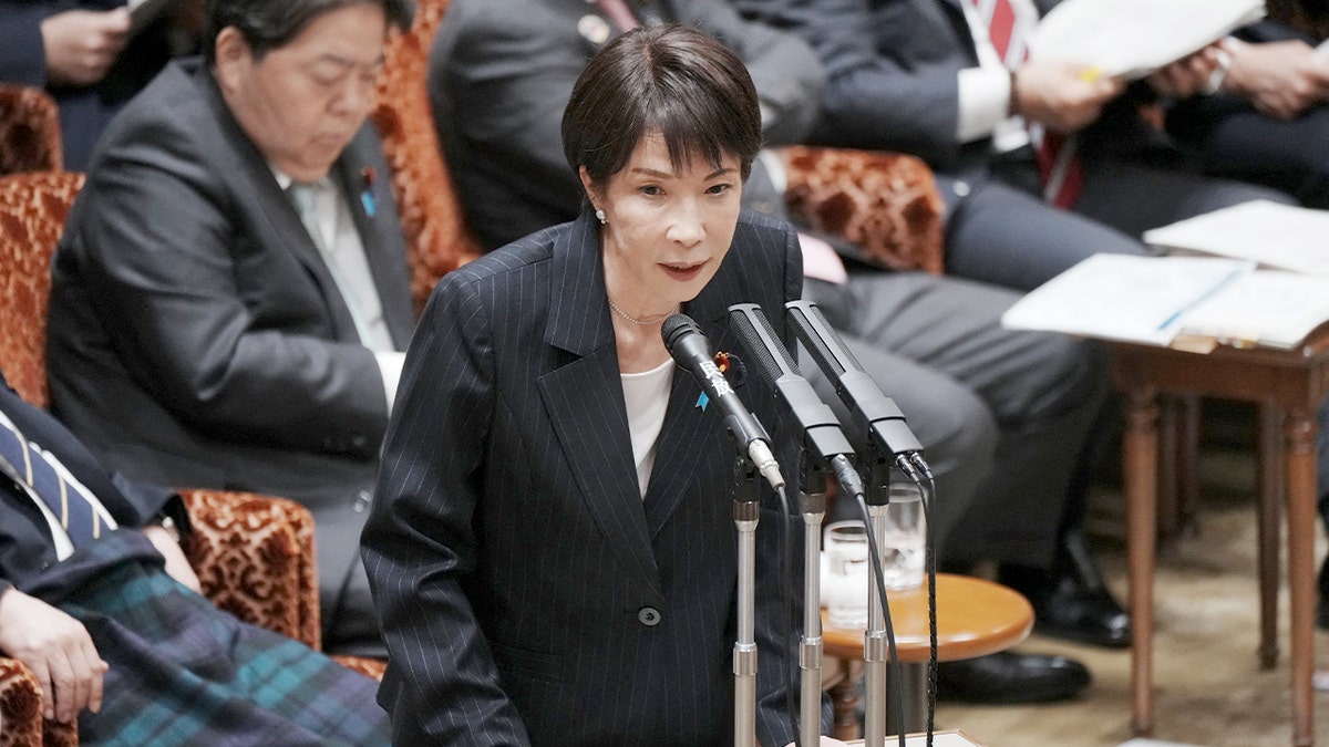 Japan’s Prime Minister Sanae Takaichi speaks while responding to questions during a parliamentary budget session in Tokyo.