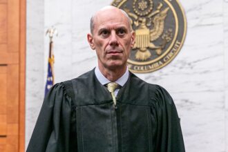 Federal judge temporarily changes grand jury rules after Trump effort to charge members of Congress