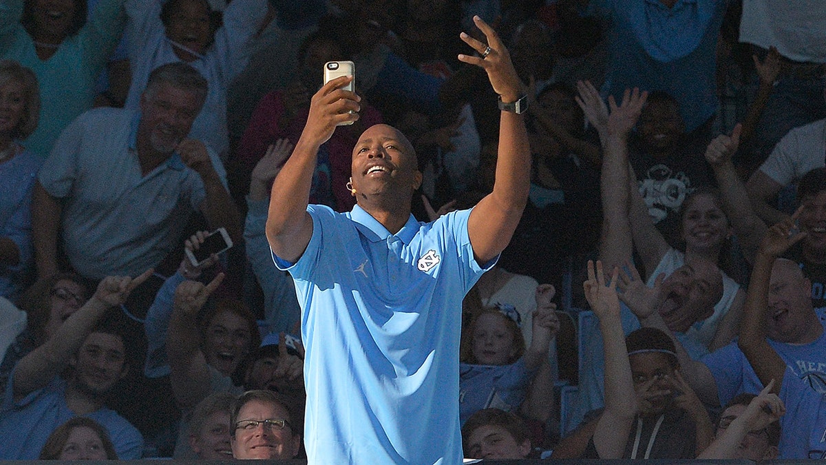 Kenny Smith poses for a photo