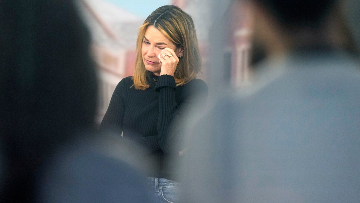 Savannah Guthrie standing on the Today show set at Rockefeller Plaza.