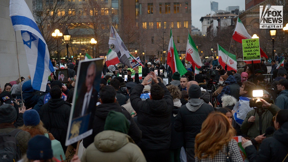 Pro-Khamenei and anti-Khamenei protesters clashing during a demonstration at Washington Square Park.
