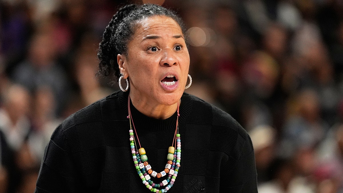 Dawn Staley coaches from the sideline