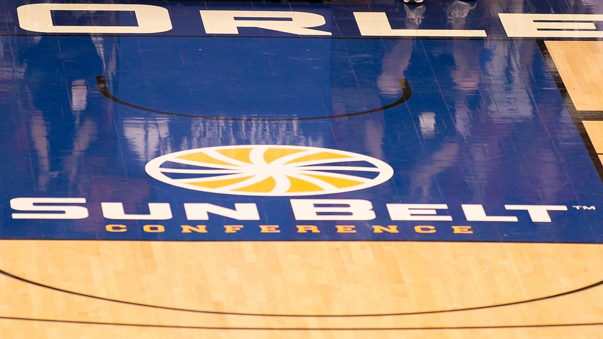 The Sun Belt Conference logo at mid court 