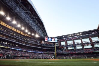 Rangers unveil statue at home ballpark, reigniting historical context debate