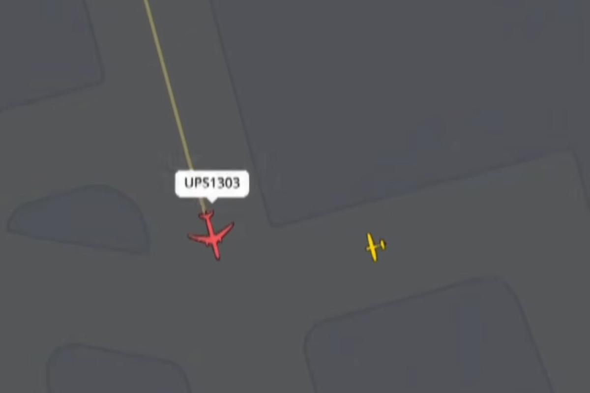 UPS jet has near miss with plane at same Kentucky airport where 14 were killed in crash as ATC shouts: ‘What are you doing?’