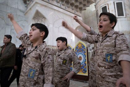 Iran Guards recruiting children as young as 12, putting them on front lines of war