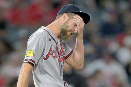 Braves ace Chris Sale slams baseball against his head after walking the bases loaded in wild scene
