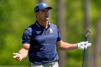 Bryson DeChambeau drills patron with tee shot, can’t escape bunker in rough first round of the Masters