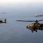 Distress call captures tanker under fire as Iran shuts Strait of Hormuz and more top headlines