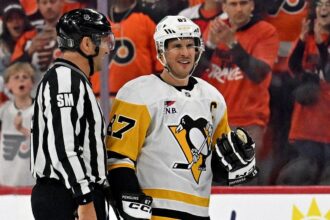 Sidney Crosby reacts to the first embellishment penalty of his 21-year career