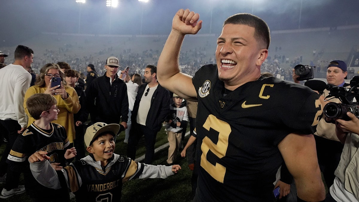 Vanderbilt quarterback Diego Pavia celebrating on the field at FirstBank Stadium in Nashville