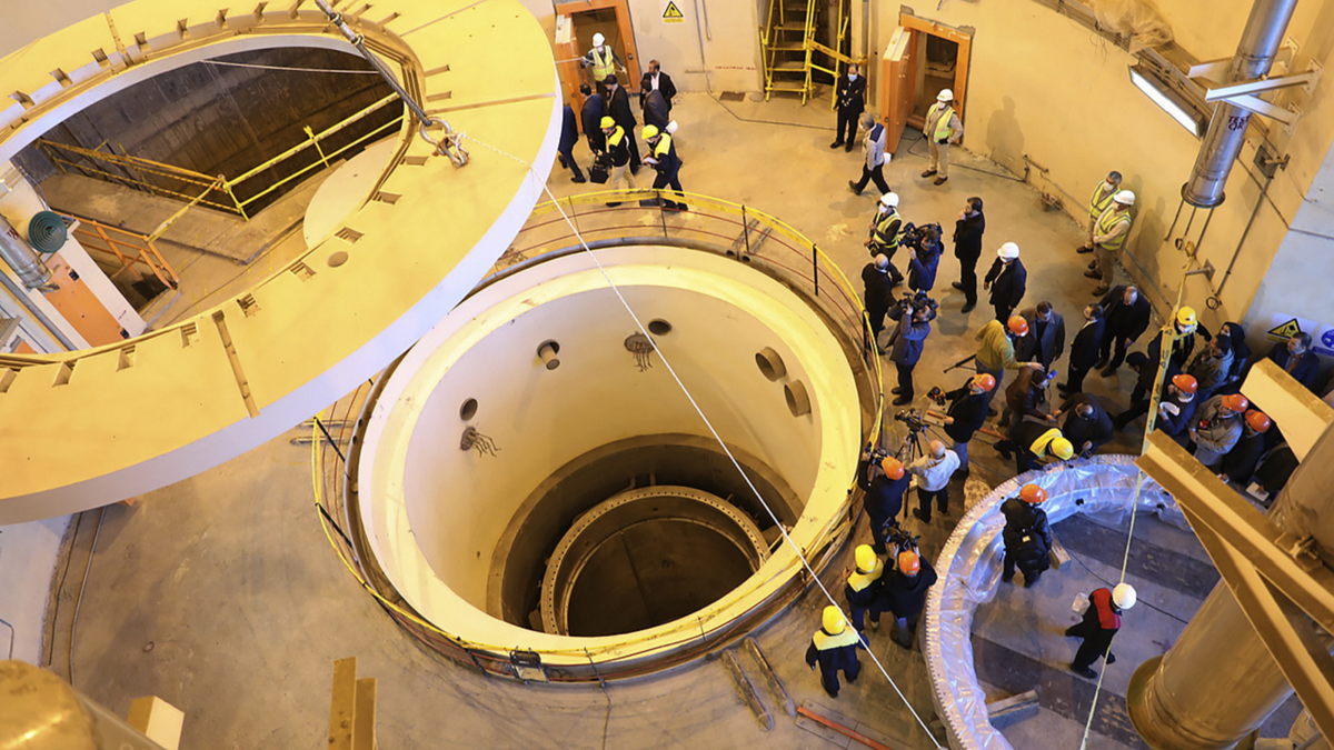 Technicians working at the Arak heavy water reactor's secondary circuit near Arak Iran