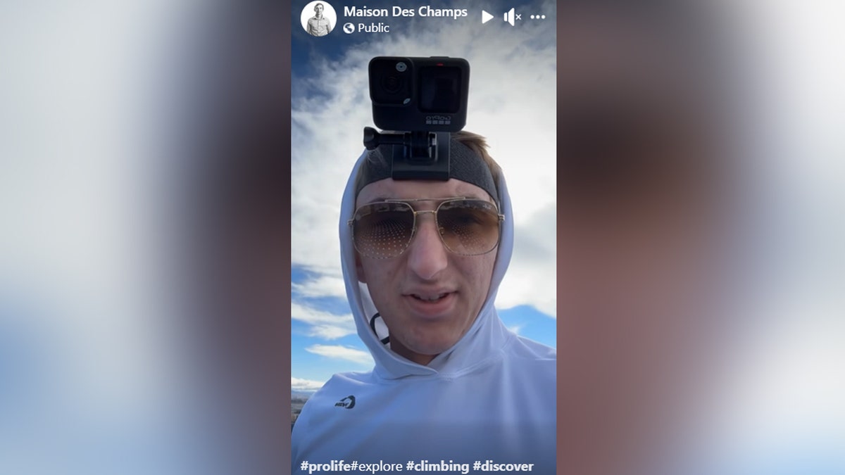 Maison Des Champs dressed as Pro-life Spiderman climbing Las Vegas Sphere