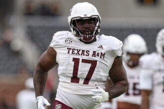 Albert Regis’ baby daughter crawled toward a Jaguars cup before he was drafted by Jacksonville