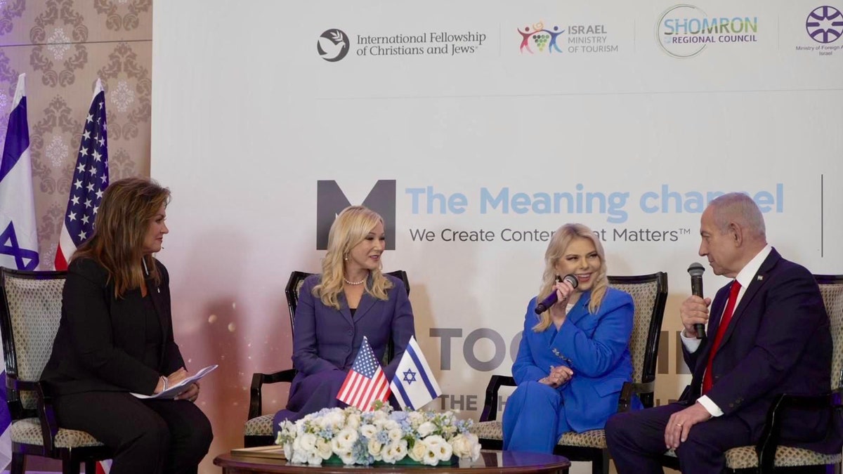 Pastor Paula White-Cain, spiritual adviser to President Donald Trump, meets Prime Minister Benjamin Netanyahu and his wife Sara at Daystar's "Together As One" event in Jerusalem, as part of a visit organized by Niv Jacobi, President of The Meaning Channel.