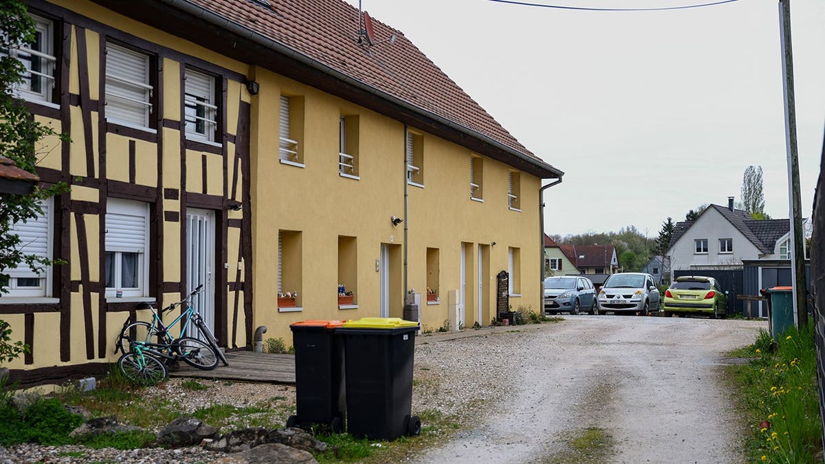 A building and parking area where a 9-year-old boy was rescued in Hagenbach, France