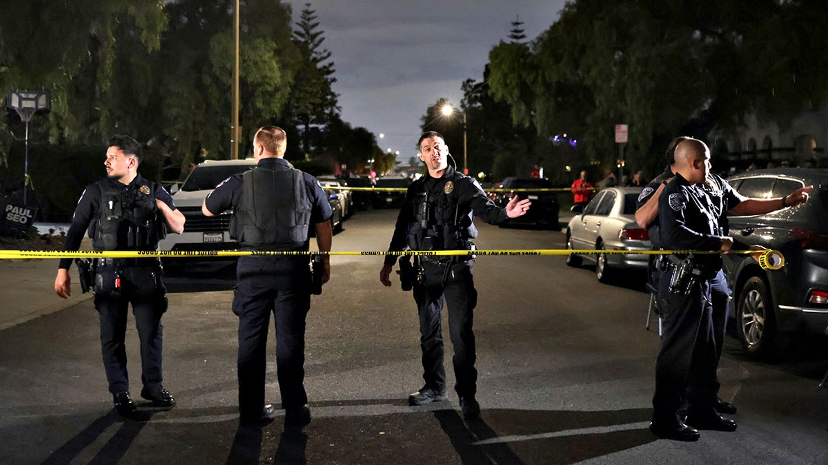 Law enforcement officials blocking off a street in Torrance, California