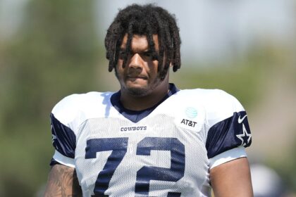 Former Cowboys player Trysten Hill appears to grin after arrest tied to alleged assault of pregnant woman