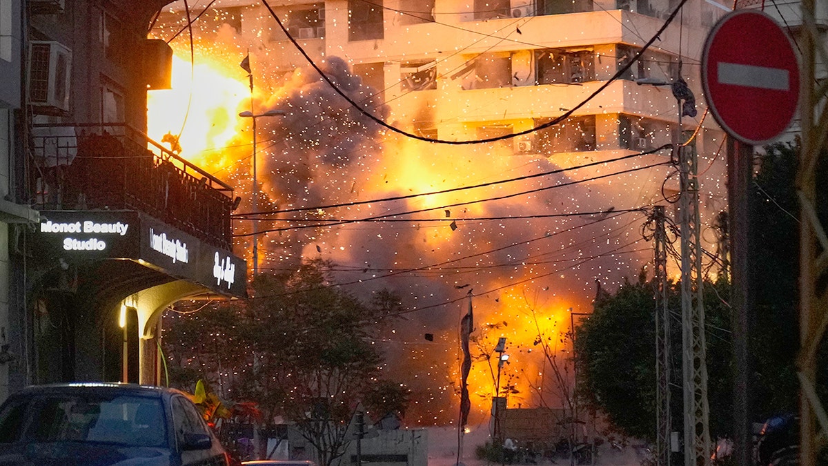 An explosion erupting from a building in central Beirut Lebanon
