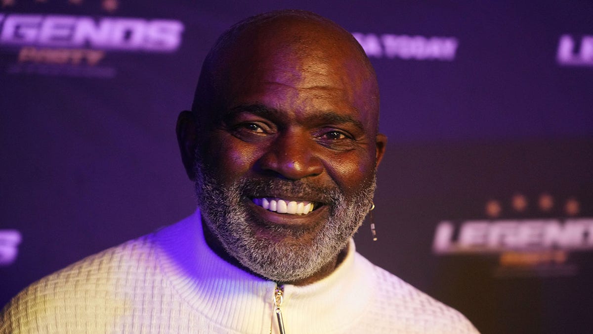 Lawrence Taylor smiling and arriving at the Legends NFL Party in Las Vegas