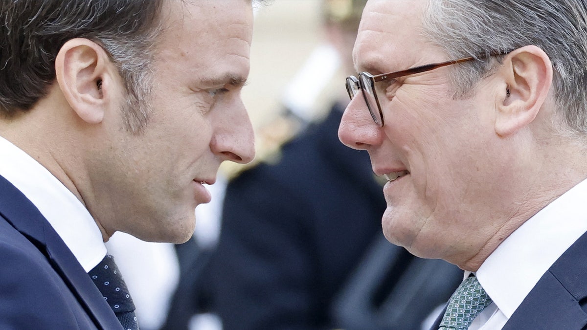 France's President Emmanuel Macron welcomes Britain's Prime Minister Keir Starmer at Elysee Presidential Palace in Paris