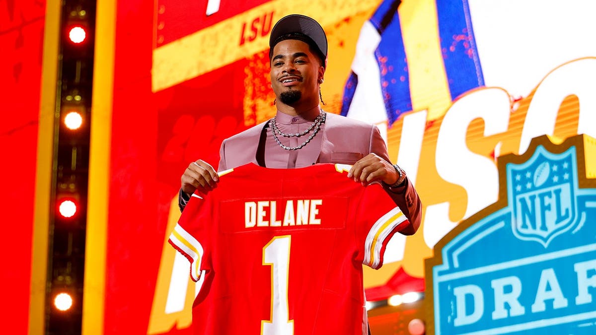 Mansoor Delane posing for a photo at Acrisure Stadium in Pittsburgh, Pennsylvania.