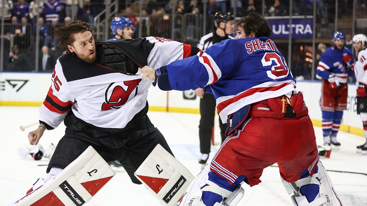 Jacob Markstrom throws a punch