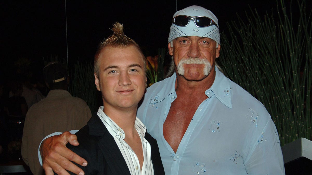 Nick Hogan and Hulk Hogan standing together backstage at Sony Studios in Los Angeles