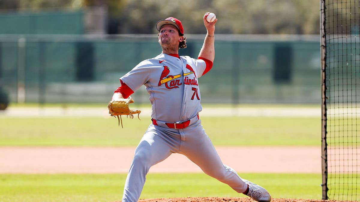 St. Louis Cardinals pitcher Packy Naughton throwing a pitch during spring training.