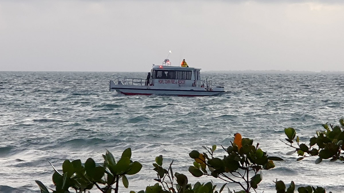 An Oak Town Volunteer Fire and Rescue boat and its crew operating in the water near Marsh Harbor.