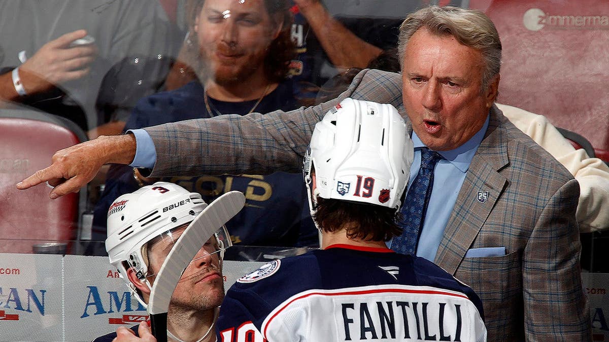 Rick Bowness directing Columbus Blue Jackets from bench during game