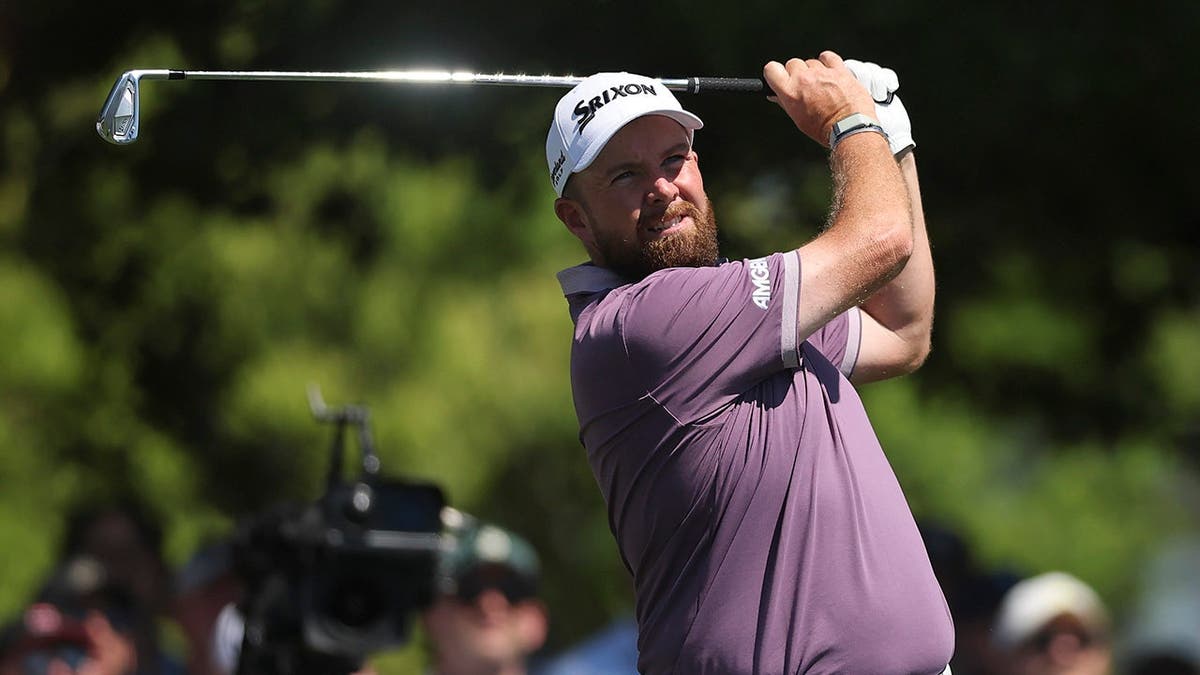 Shane Lowry playing a golf shot from the fourth tee at Augusta National Golf Club