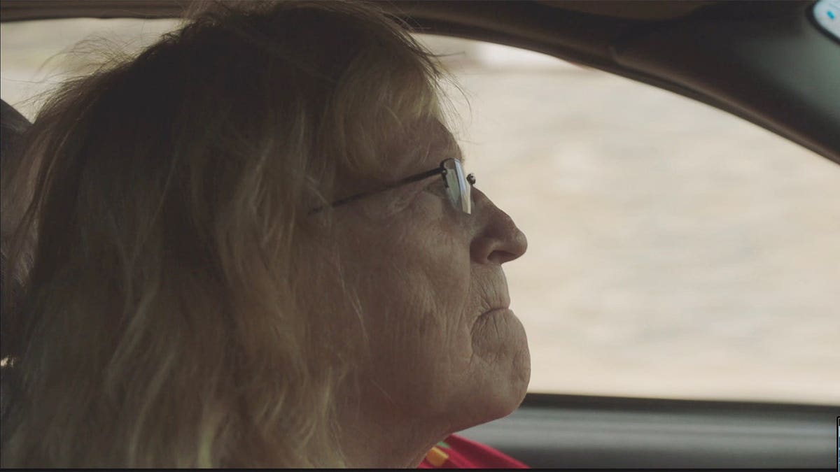 Richard Russell's mother driving a car.